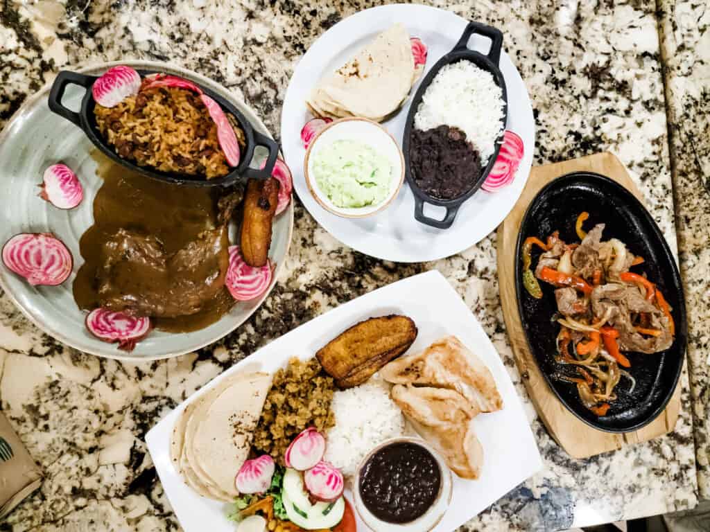 Several plates of traditional Costa Rican food.