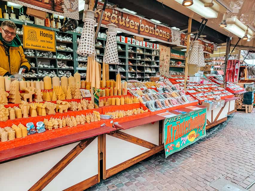 A view of a stall selling beeswax candles in the Harbor Market.