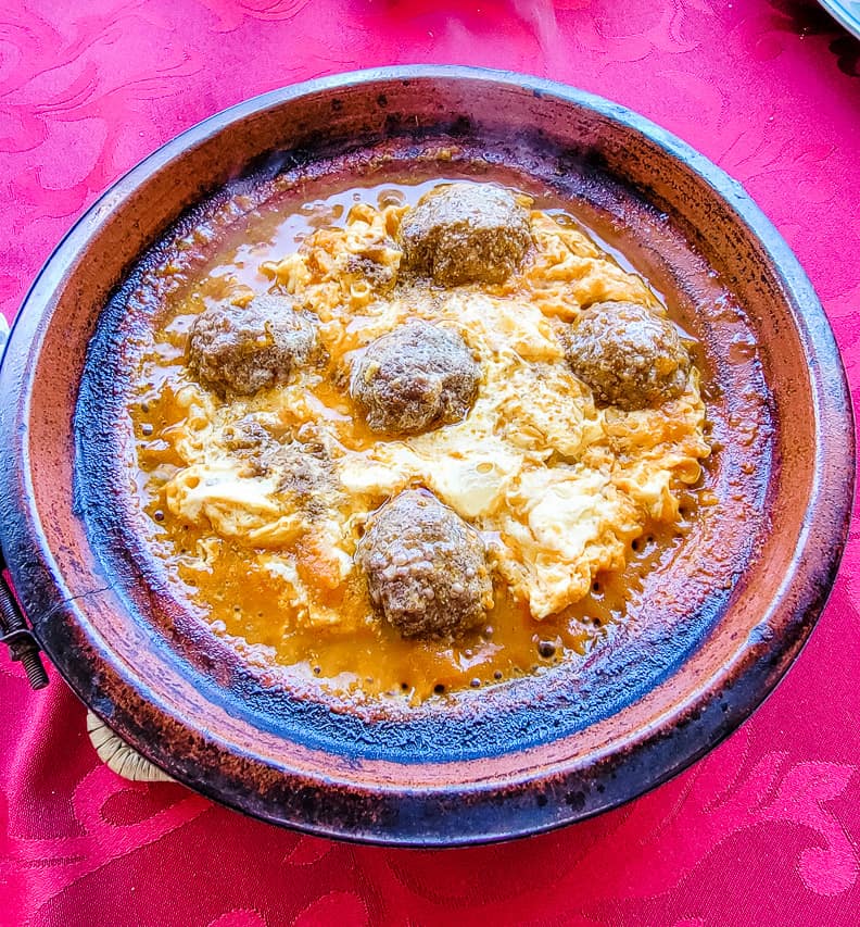 A kefta tagine. Meatballs served with eggs and tomato sauce. A delicious food to try in Morocco.
