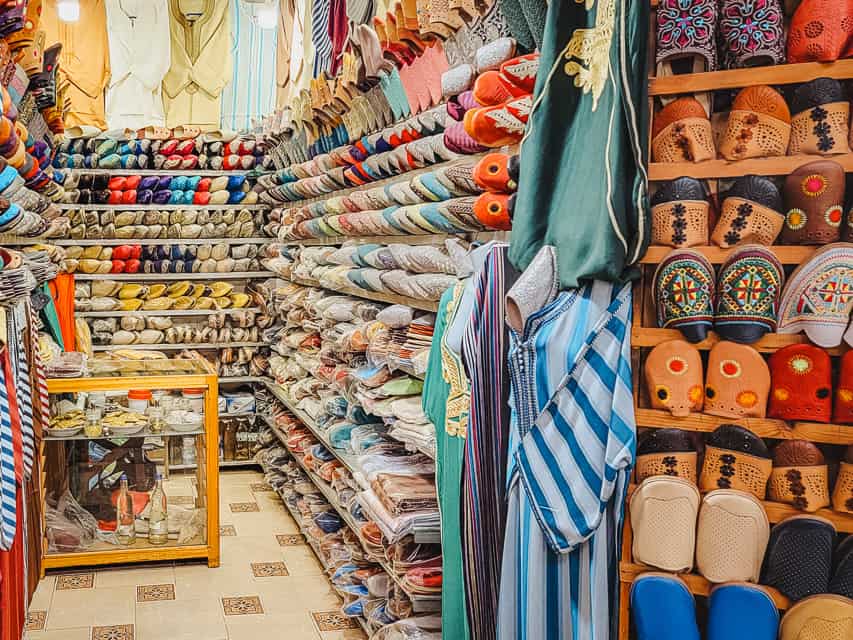 A small shop is filled with rows and rows of leather slippers called babouche.