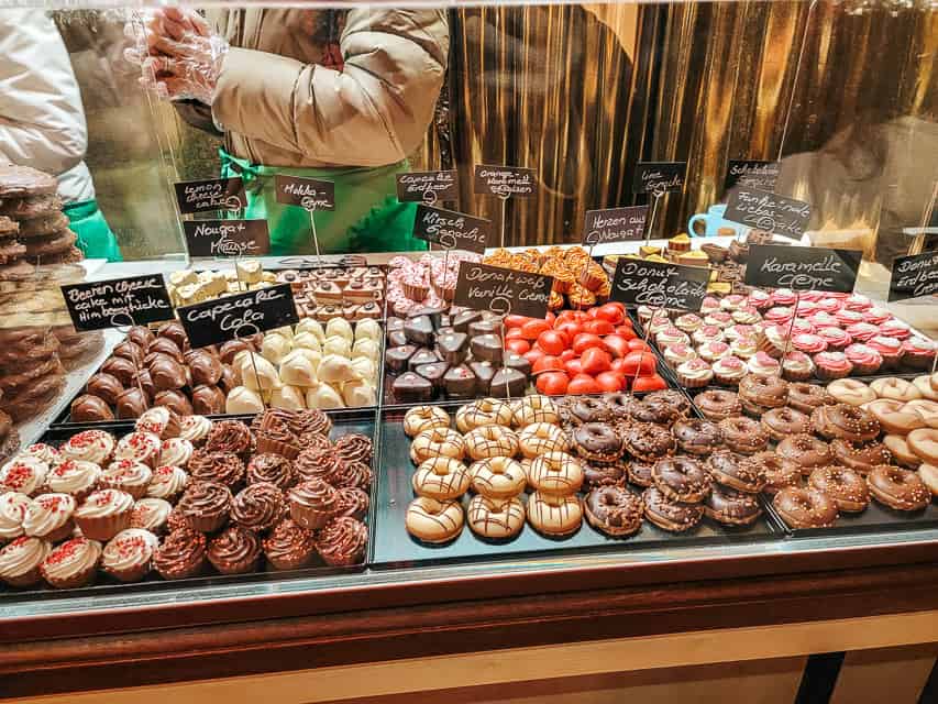 Specialty chocolates shaped like donuts and cupcakes at the Cologne markets.