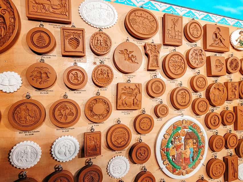 Traditional cookie presses displayed in a stall at the Basel Christmas market.