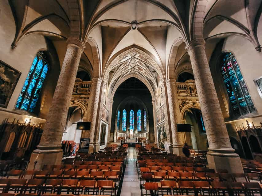 The inside of the notre dame cathedral in Luxembourg - with soaring arched ceillings.