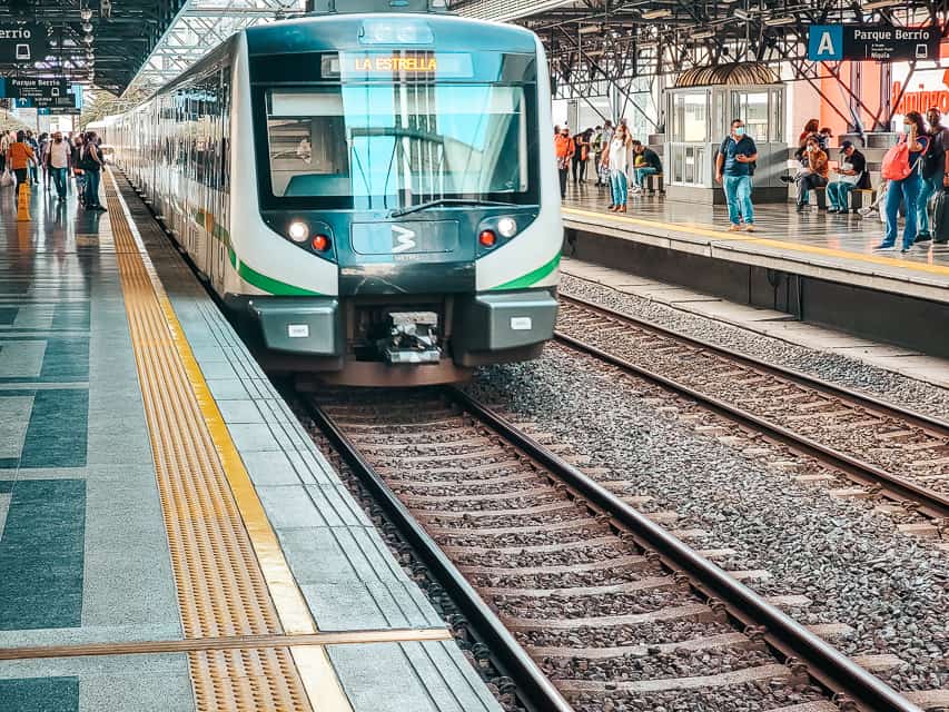 A metro train arrives at a station in Medellin, Colombia.