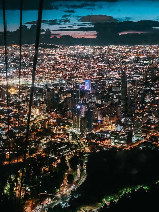 The lights are on in the darkness in the city of Bogota. Views from the mountain.