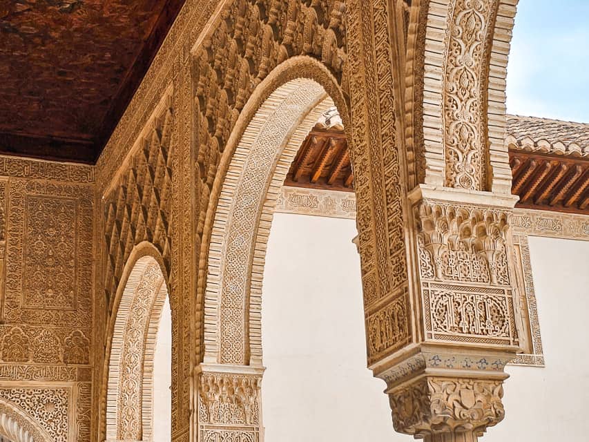 The intricately carved stucco that adorns the arches in the Nasrid Palaces - one of the top reasons to visit Granada.