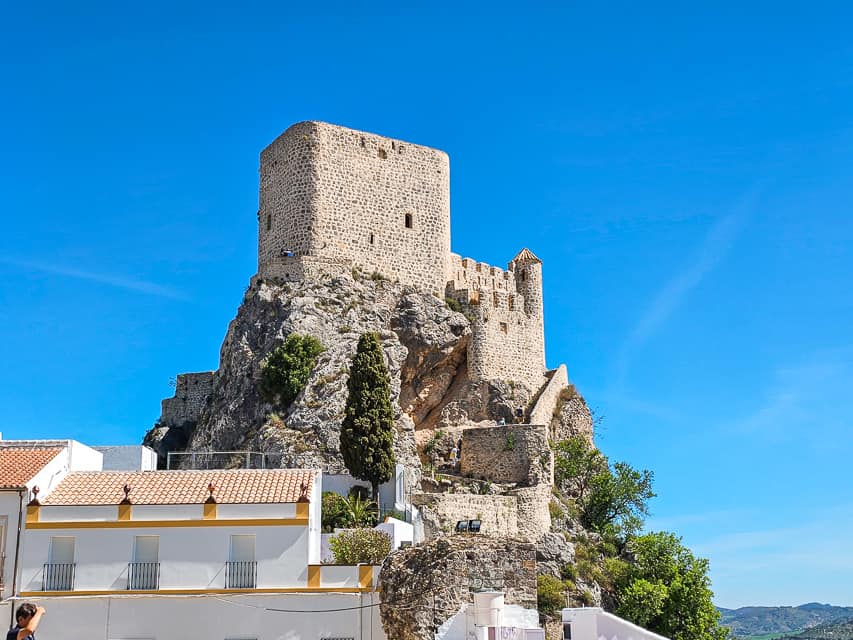 Stone castle(Castillo Arabe) on a tall hill.