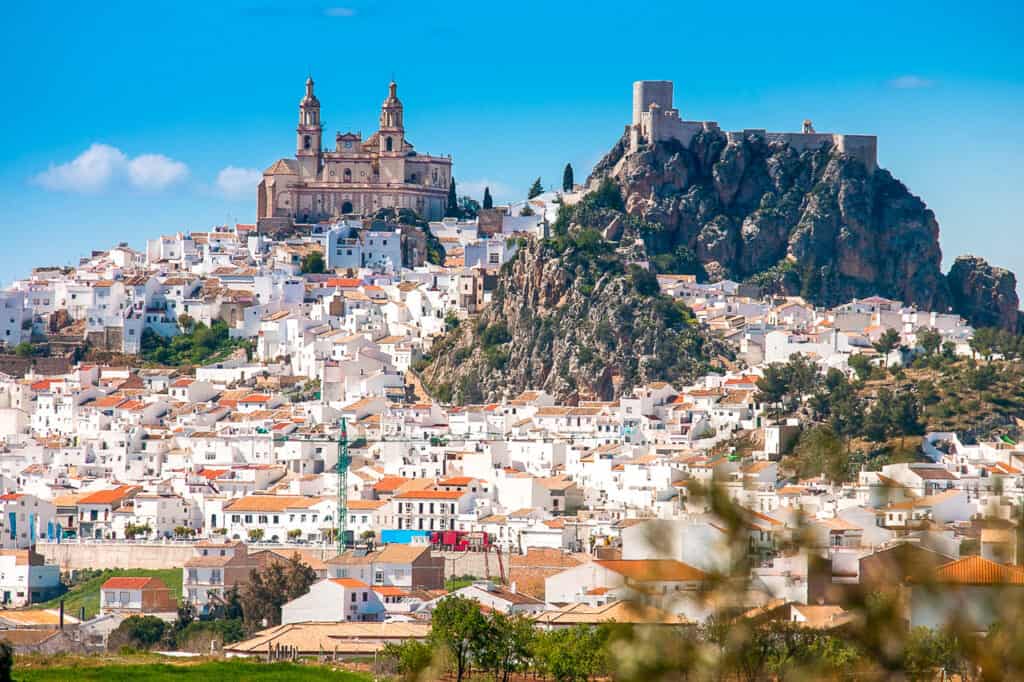 View of Olvera, Spain with 22 castles on hills overlooking the city.