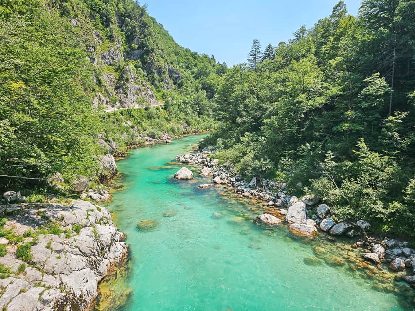 A view of the crystal blue water of the Soča river.